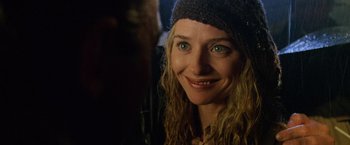 Movie still from “Godzilla” (1998), directed by Roland Emmerich – A person wearing a hat; Close Up shot, Over the shoulder angle