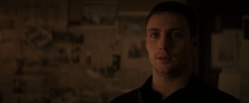 Movie still from “Godzilla” (2014), directed by Gareth Edwards – A person in a dark room; Close Up shot, Low angle