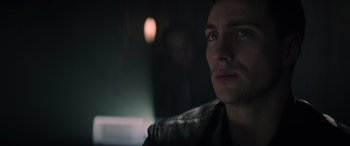 Movie still from “Godzilla” (2014), directed by Gareth Edwards – A person wearing a leather jacket; Close Up shot, Low angle
