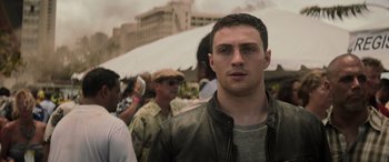 Movie still from “Godzilla” (2014), directed by Gareth Edwards – A person wearing a leather jacket; Close Up shot, Low angle