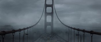 Movie still from “Godzilla” (2014), directed by Gareth Edwards – A very long bridge with a bunch of cars on it; Extreme Wide shot, High angle