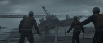 Movie still from “Godzilla” (2014), directed by Gareth Edwards – Two men standing in front of an abandoned ship; Extreme Wide shot, Low angle