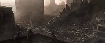Movie still from “Godzilla” (2014), directed by Gareth Edwards – A large monster is in the middle of a city; Extreme Wide shot, High angle