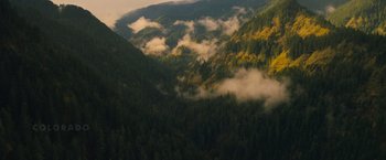 Movie still from “Godzilla: King of the Monsters” (2019), directed by Michael Dougherty – A view of a valley with a lot of trees on it; Extreme Wide shot, High angle