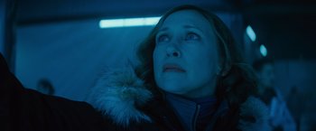 Movie still from “Godzilla: King of the Monsters” (2019), directed by Michael Dougherty – A person looking up at the sky; Close Up shot, Low angle