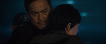 Movie still from “Godzilla: King of the Monsters” (2019), directed by Michael Dougherty – A man and a woman looking at one another; Close Up shot, Over the shoulder angle