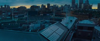 Movie still from “Godzilla: King of the Monsters” (2019), directed by Michael Dougherty – A view of a stadium from above at dusk; Extreme Wide shot, High angle
