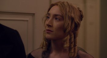 Movie still from “Ammonite” (2020), directed by Francis Lee – A person with long hair; Close Up shot, Over the shoulder angle