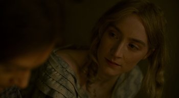 Movie still from “Ammonite” (2020), directed by Francis Lee – A person looking at the camera; Close Up shot, Over the shoulder angle