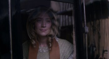 Movie still from “Ammonite” (2020), directed by Francis Lee – A woman is looking out of a train window; Close Up shot, Over the shoulder angle
