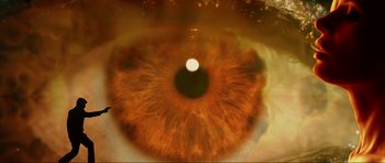 Movie still from “GoldenEye” (1995), directed by Martin Campbell – An image of an eye that is looking into the camera; Extreme Close Up shot, Overhead angle