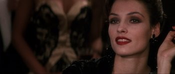 Movie still from “GoldenEye” (1995), directed by Martin Campbell – A person wearing a black jacket; Close Up shot, Over the shoulder angle