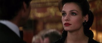 Movie still from “GoldenEye” (1995), directed by Martin Campbell – A person wearing a leather jacket; Close Up shot, Over the shoulder angle