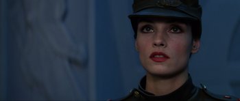 Movie still from “GoldenEye” (1995), directed by Martin Campbell – A person wearing a uniform; Close Up shot, Low angle