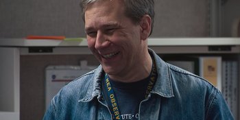 Movie still from “Good Night Oppy” (2022), directed by Ryan White – A person wearing a jean jacket; Close Up shot, High angle