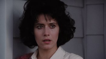 Movie still from “Goodfellas” (1990), directed by Martin Scorsese – A person wearing a white shirt; Close Up shot, Low angle