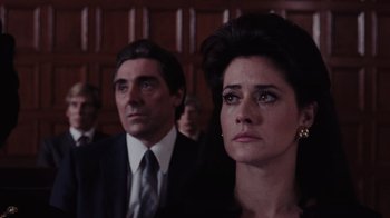 Movie still from “Goodfellas” (1990), directed by Martin Scorsese – A man and a woman in a court room; Close Up shot, Low angle