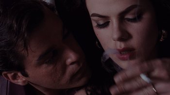 Movie still from “Goodfellas” (1990), directed by Martin Scorsese – A man and a woman are looking at each other; Close Up shot, Overhead angle