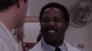 Movie still from “Goodfellas” (1990), directed by Martin Scorsese – A person wearing a white shirt and a tie; Close Up shot, Low angle