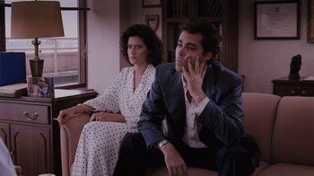 Movie still from “Goodfellas” (1990), directed by Martin Scorsese – A man and a woman sitting next to each other; Medium shot, Low angle