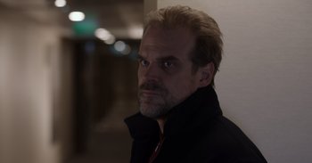 Movie still from “Gran Turismo” (2023), directed by Neill Blomkamp – A person wearing a jacket; Close Up shot, Low angle