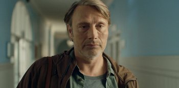 Movie still from “Another Round” (2020), directed by Thomas Vinterberg – A person wearing a jacket; Close Up shot, Low angle