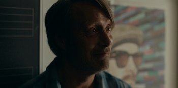 Movie still from “Another Round” (2020), directed by Thomas Vinterberg – A person wearing a blue shirt; Close Up shot, Over the shoulder angle