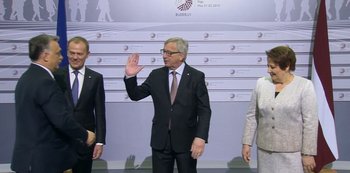 Movie still from “Another Round” (2020), directed by Thomas Vinterberg – A man in a black suit and a tie; Wide shot, Low angle