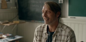 Movie still from “Another Round” (2020), directed by Thomas Vinterberg – A person wearing a shirt and a tie; Close Up shot, Over the shoulder angle