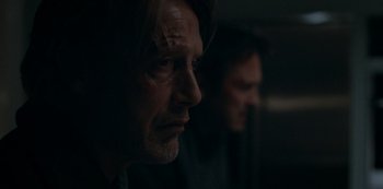 Movie still from “Another Round” (2020), directed by Thomas Vinterberg – A person looking at the camera; Close Up shot, Over the shoulder angle