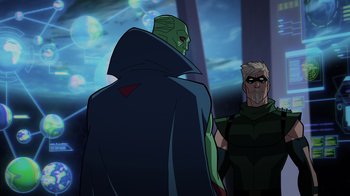 Movie still from “Green Lantern: Beware My Power” (2022), directed by Jeff Wamester – A man in a green suit and a man in a black suit and a man in a green suit and a man in a black suit; Medium shot, Over the shoulder angle