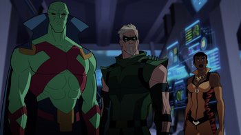 Movie still from “Green Lantern: Beware My Power” (2022), directed by Jeff Wamester – Two men standing next to each other in a room; Medium shot, Over the shoulder angle