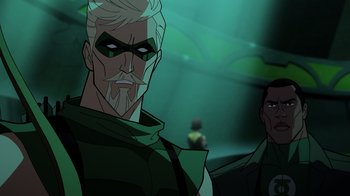 Movie still from “Green Lantern: Beware My Power” (2022), directed by Jeff Wamester – A man with a beard is standing next to another man; Close Up shot, Over the shoulder angle