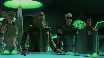 Movie still from “Green Lantern: Beware My Power” (2022), directed by Jeff Wamester – A group of men standing next to each other in a room; Medium shot, Low angle