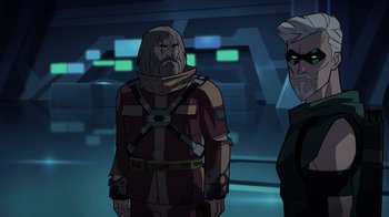 Movie still from “Green Lantern: Beware My Power” (2022), directed by Jeff Wamester – A man with a long beard standing next to another man; Medium shot, Over the shoulder angle