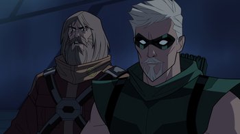 Movie still from “Green Lantern: Beware My Power” (2022), directed by Jeff Wamester – A man with white hair and a man with a beard; Close Up shot, Over the shoulder angle