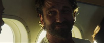 Movie still from “Greenland” (2020), directed by Ric Roman Waugh – A person with a beard; Close Up shot, Over the shoulder angle