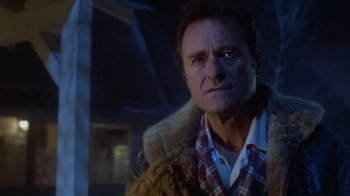 Movie still from “Gremlins” (1984), directed by Joe Dante – A person wearing a jacket; Close Up shot, Low angle