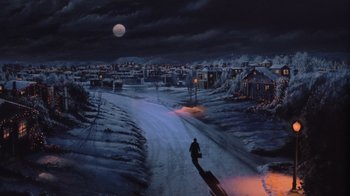 Movie still from “Gremlins” (1984), directed by Joe Dante – A man walking down a snow covered road; Extreme Wide shot, High angle