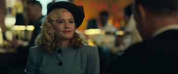 Movie still from “Greyhound” (2020), directed by Aaron Schneider – A woman wearing a hat and a jacket; Close Up shot, Over the shoulder angle