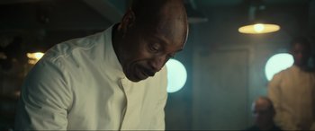 Movie still from “Greyhound” (2020), directed by Aaron Schneider – A person wearing a white shirt; Close Up shot, Low angle