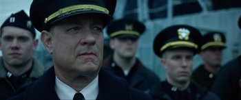 Movie still from “Greyhound” (2020), directed by Aaron Schneider – A group of men in uniform standing next to each other; Close Up shot, Over the shoulder angle