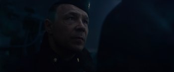 Movie still from “Greyhound” (2020), directed by Aaron Schneider – A person wearing a uniform; Close Up shot, Low angle