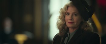 Movie still from “Greyhound” (2020), directed by Aaron Schneider – A person wearing a suit and tie; Close Up shot, Over the shoulder angle