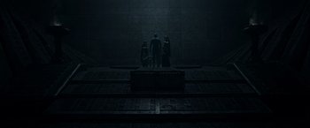 Movie still from “Guardians of the Galaxy” (2014), directed by James Gunn – A group of people standing in a dark room; Extreme Wide shot, Low angle