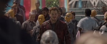 Movie still from “Guardians of the Galaxy” (2014), directed by James Gunn – A group of people in a room with masks on them; Medium shot, Over the shoulder angle