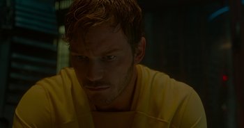 Movie still from “Guardians of the Galaxy” (2014), directed by James Gunn – A person wearing a yellow shirt; Close Up shot, Over the shoulder angle