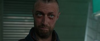 Movie still from “Guardians of the Galaxy” (2014), directed by James Gunn – A person with a bruised eye; Close Up shot, Low angle