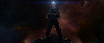 Movie still from “Guardians of the Galaxy” (2014), directed by James Gunn – A person in a space suit standing on top of an object; Wide shot, Low angle