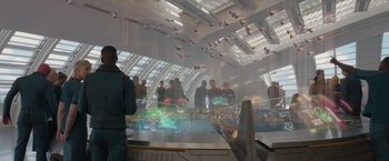 Movie still from “Guardians of the Galaxy” (2014), directed by James Gunn – A group of people standing in front of a building; Wide shot, High angle